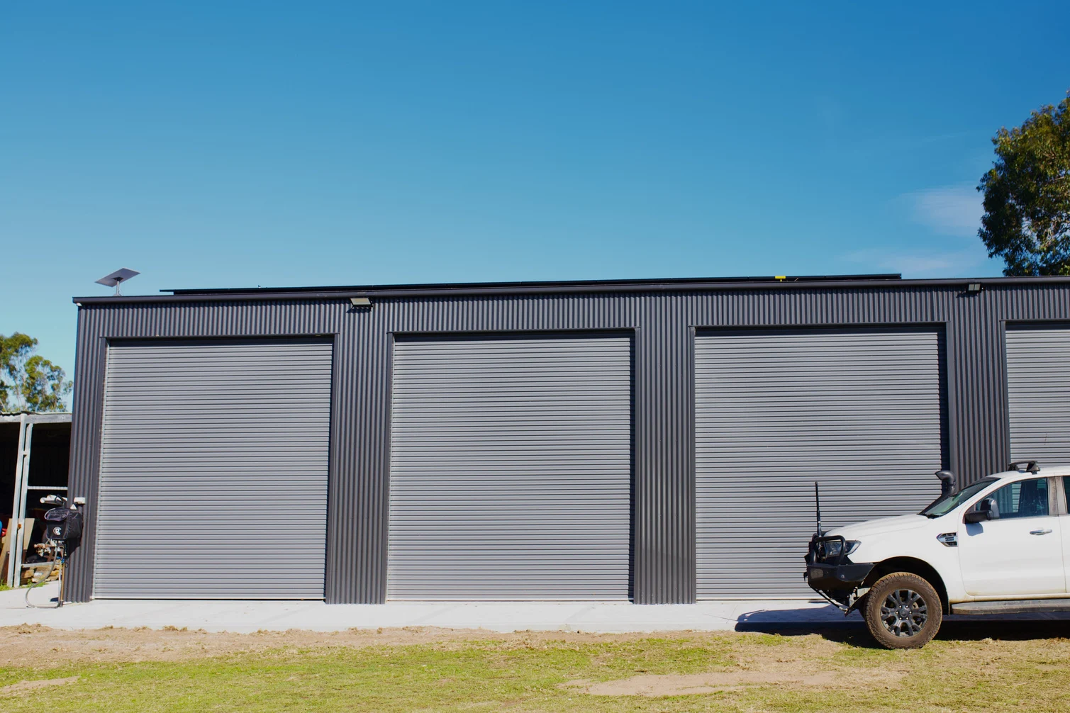 The shed that houses the inverter and battery stack
