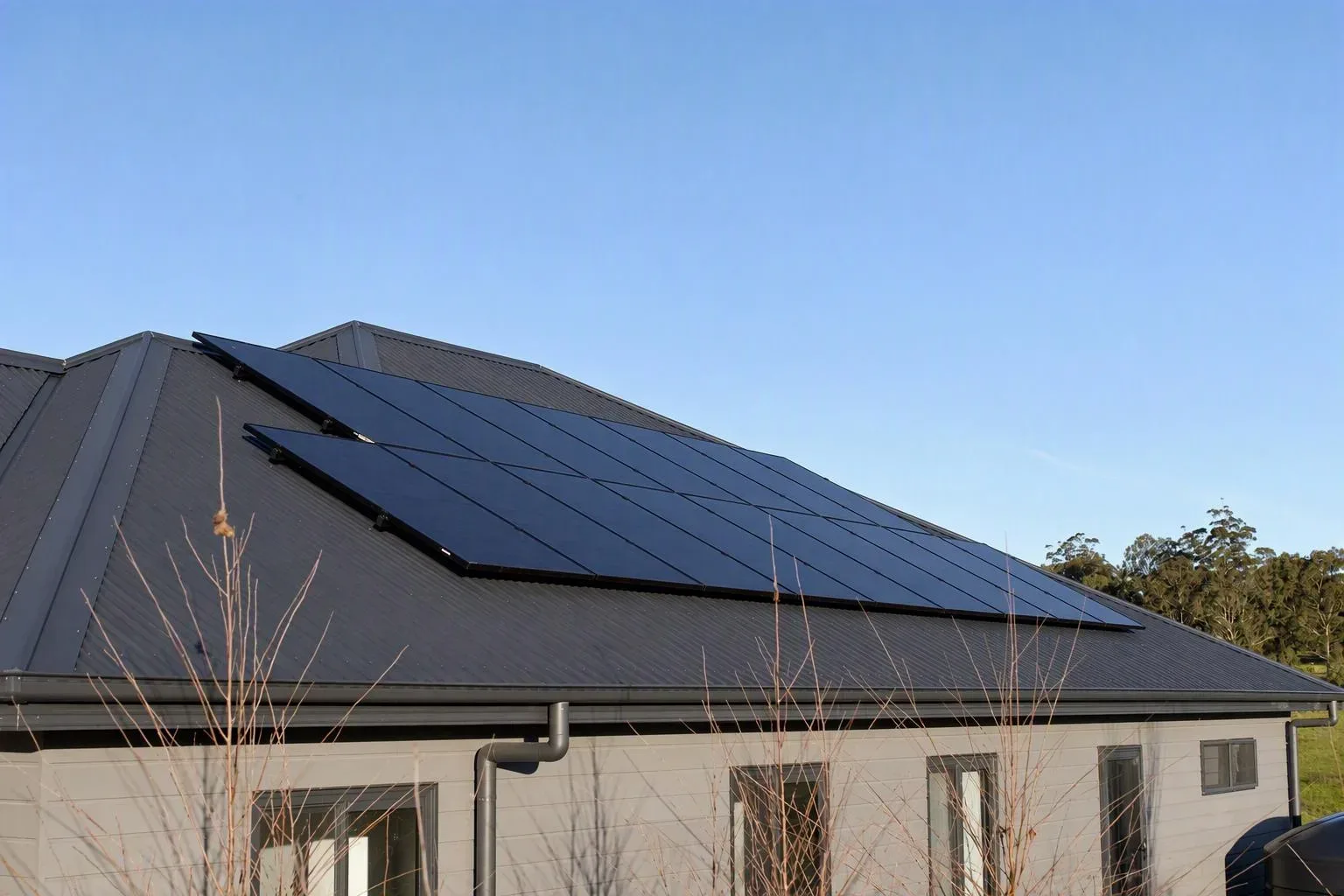 Australian-made Tindo panels across the roof of the house