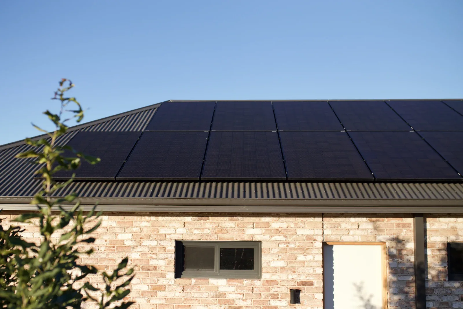 The full solar array across the roof of the house