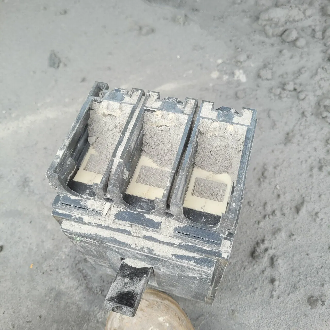 Dust accumulated around the internal sections of the failed MCCB