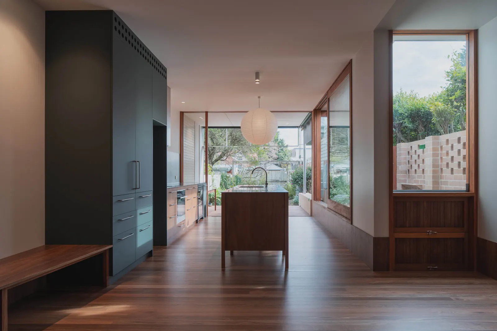 Kitchen lighting, with a round paper pendant over the island