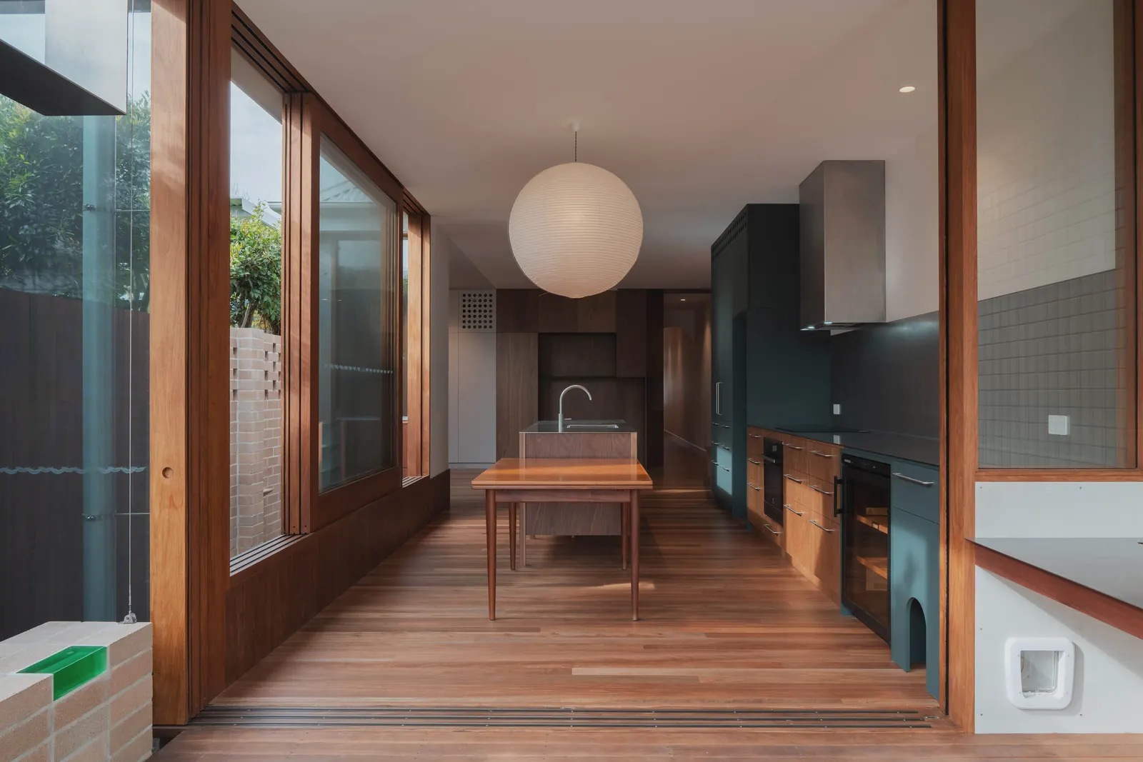 The kitchen and living area seen from the rear deck