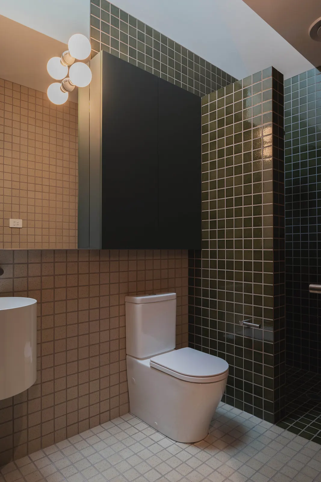 Bathroom lighting, with a cluster of globe wall lights